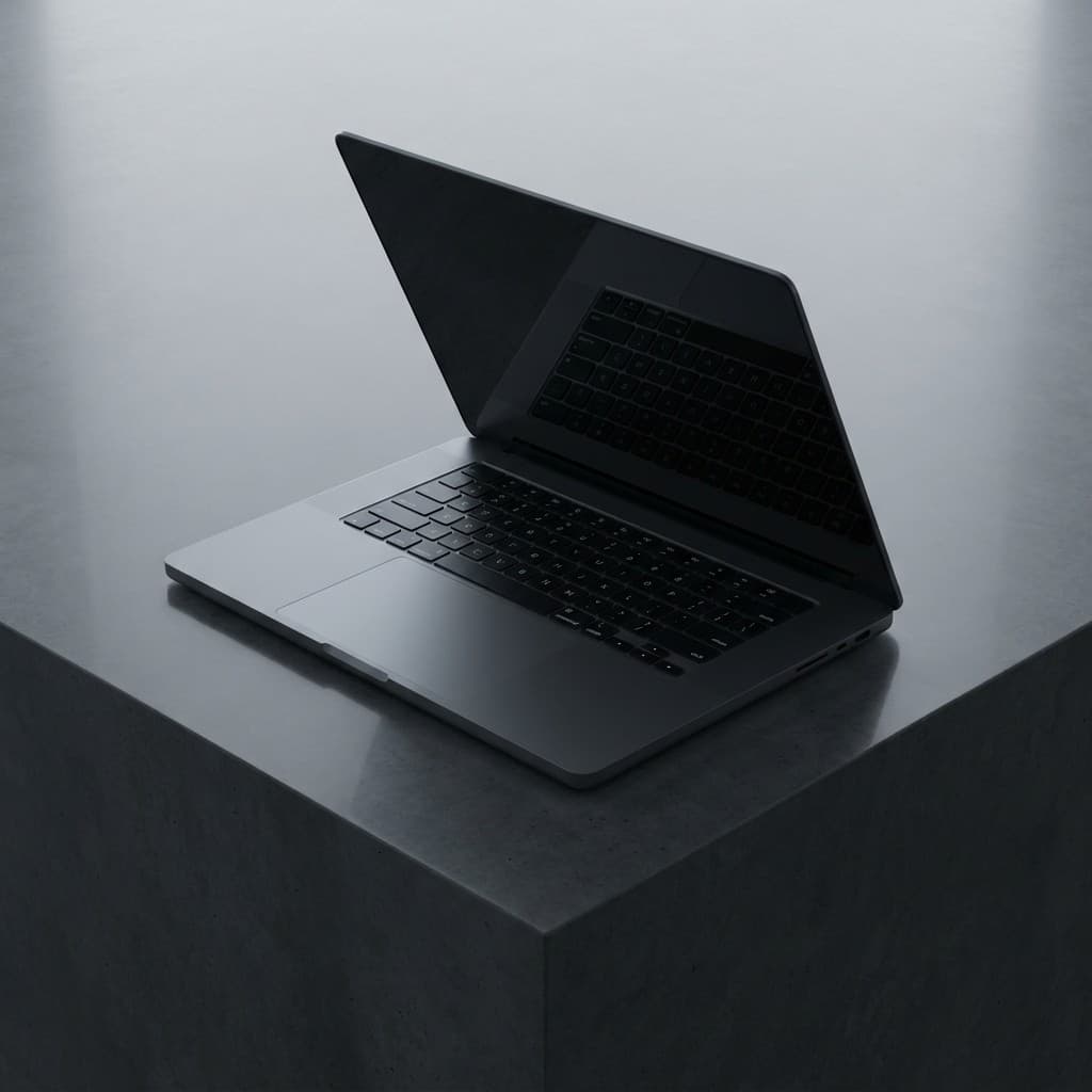 Refurbished Laptop auf grauem Untergrund